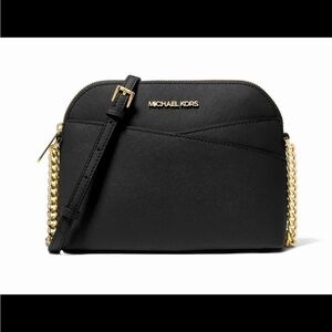 Michael Kors Elegant Black and Gold Crossbody Bag with outside pocket